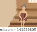 一位女士在桑拿房裡放鬆身心 141929805