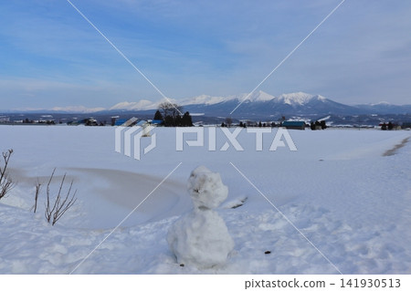 Furano Line: A view of the Daisetsuzan mountain range in mid-winter, towards Mount Asahidake (near the lavender fields). Furano Line: A view of the Daisetsuzan mountain range in mid-winter, towards Mount Asahidake (near the lavender fields). 141930513