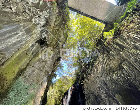 The columnar jointing of Takachiho Gorge and the rocky cliffs of the valley, viewed from above. The columnar jointing of Takachiho Gorge and the rocky cliffs of the valley, viewed from above. 141930750