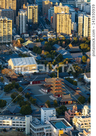 Shitennoji Temple and its five-story pagoda viewed from the Abeno Harukas observation deck at dusk. Shitennoji Temple and its five-story pagoda viewed from the Abeno Harukas observation deck at dusk. 141930939