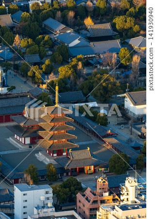 Shitennoji Temple and its five-story pagoda viewed from the Abeno Harukas observation deck at dusk. Shitennoji Temple and its five-story pagoda viewed from the Abeno Harukas observation deck at dusk. 141930940