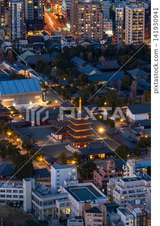A view of Shitennoji Temple and its illuminated five-story pagoda at night, seen from the Abeno Harukas observation deck. A view of Shitennoji Temple and its illuminated five-story pagoda at night, seen from the Abeno Harukas observation deck. 141930941