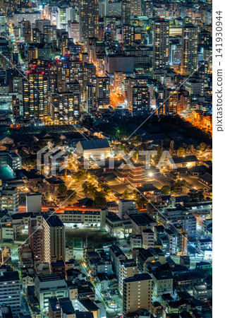 A view of Shitennoji Temple and its illuminated five-story pagoda at night, seen from the Abeno Harukas observation deck. A view of Shitennoji Temple and its illuminated five-story pagoda at night, seen from the Abeno Harukas observation deck. 141930944