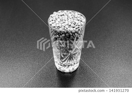 Organic dry buckwheat grains consisting of raw natural product Organic dry buckwheat grains consisting of raw natural product 141931270