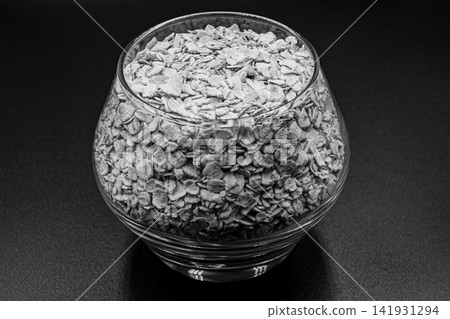 beautiful texture ripe of natural flakes oat on background beautiful texture ripe of natural flakes oat on background 141931294