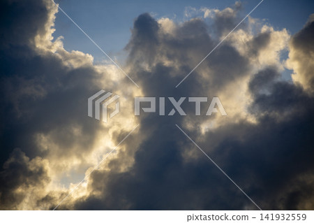 A dramatic scene: sunlight filtering through gaps in the clouds on Amami Oshima Island. A dramatic scene: sunlight filtering through gaps in the clouds on Amami Oshima Island. 141932559