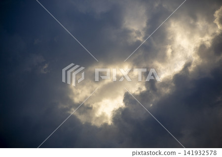Amami Oshima: Light shining through the blue sky and clouds after a storm. Amami Oshima: Light shining through the blue sky and clouds after a storm. 141932578