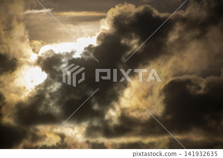 A dramatic scene: sunlight filtering through gaps in the clouds on Amami Oshima Island. A dramatic scene: sunlight filtering through gaps in the clouds on Amami Oshima Island. 141932635