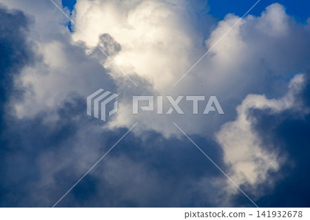 A dramatic scene: sunlight filtering through gaps in the clouds on Amami Oshima Island. A dramatic scene: sunlight filtering through gaps in the clouds on Amami Oshima Island. 141932678