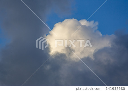 A dramatic scene: sunlight filtering through gaps in the clouds on Amami Oshima Island. A dramatic scene: sunlight filtering through gaps in the clouds on Amami Oshima Island. 141932680