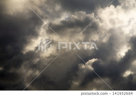 A dramatic scene: sunlight filtering through gaps in the clouds on Amami Oshima Island. A dramatic scene: sunlight filtering through gaps in the clouds on Amami Oshima Island. 141932684