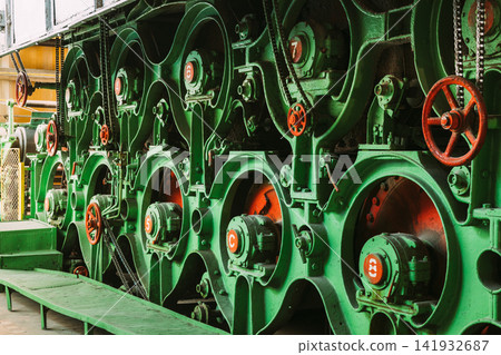 Shafts Of Old Paper-making Machine. Close Up Shafts Of Old Paper-making Machine. Close Up 141932687