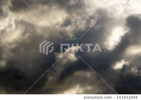 A dramatic scene: sunlight filtering through gaps in the clouds on Amami Oshima Island. A dramatic scene: sunlight filtering through gaps in the clouds on Amami Oshima Island. 141932694
