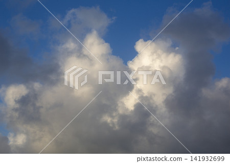 A dramatic scene: sunlight filtering through gaps in the clouds on Amami Oshima Island. A dramatic scene: sunlight filtering through gaps in the clouds on Amami Oshima Island. 141932699