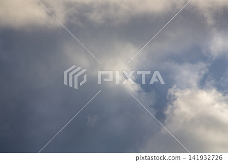 A dramatic scene: sunlight filtering through gaps in the clouds on Amami Oshima Island. A dramatic scene: sunlight filtering through gaps in the clouds on Amami Oshima Island. 141932726