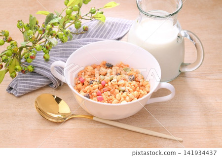 Breakfast cereal (granola and milk). Breakfast cereal (granola and milk). 141934437