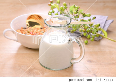 Breakfast cereal (granola and milk). Breakfast cereal (granola and milk). 141934444