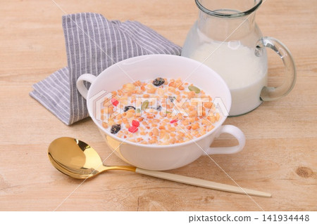 Breakfast cereal (granola and milk). Breakfast cereal (granola and milk). 141934448