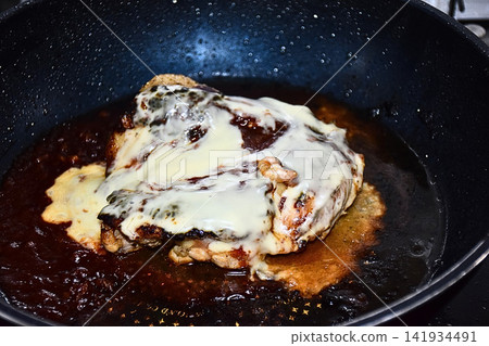 Chicken thigh with cheese teriyaki Chicken thigh with cheese teriyaki 141934491