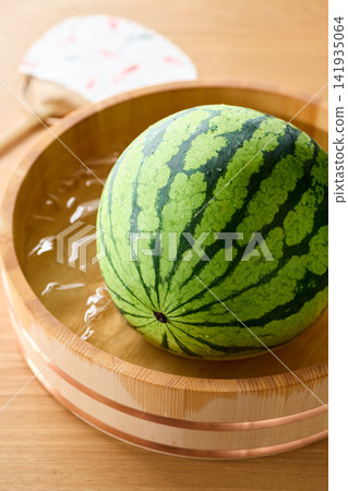 Watermelon chilled in a bucket Watermelon chilled in a bucket 141935064