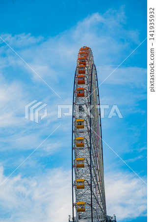 Summer in Yokohama's Minato Mirai district under a clear blue sky, showcasing the dynamic landscape of the waterfront and the city. Summer in Yokohama's Minato Mirai district under a clear blue sky, showcasing the dynamic landscape of the waterfront and the city. 141935932