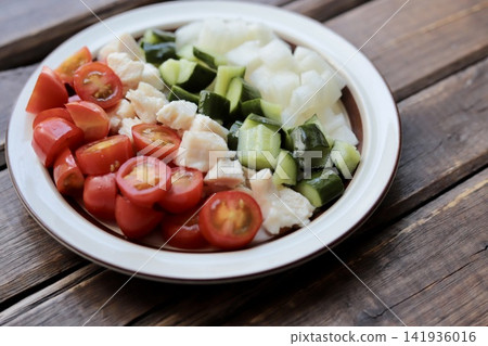 A small, single-serving Cobb salad-style chicken salad. A small, single-serving Cobb salad-style chicken salad. 141936016
