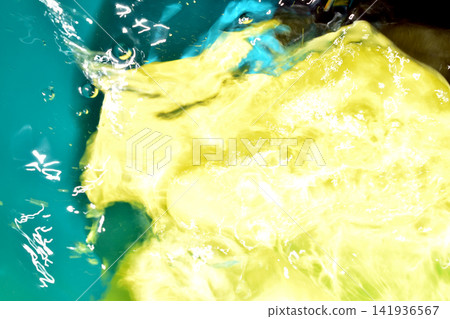 Abstract close-up with a vibrant combination of yellow, green and blue colors Abstract close-up with a vibrant combination of yellow, green and blue colors 141936567