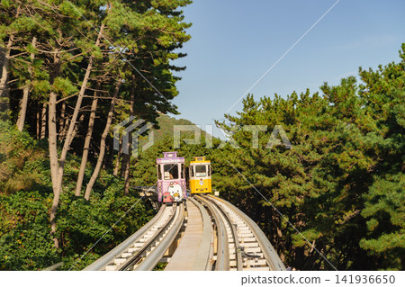 Haeundae Blueline Park, Busan, South Korea - Nov. 11, 2024: Sky Capsule trains. Haeundae Blueline Park, Busan, South Korea - Nov. 11, 2024: Sky Capsule trains. 141936650
