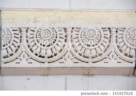 Erzurum Double Minaret Madrasa Stone Intricate Carvings and Embellishments. Decorative sandstone wall of Agra Fort India. High quality photo Erzurum Double Minaret Madrasa Stone Intricate Carvings and Embellishments. Decorative sandstone wall of Agra Fort India. High quality photo 141937028