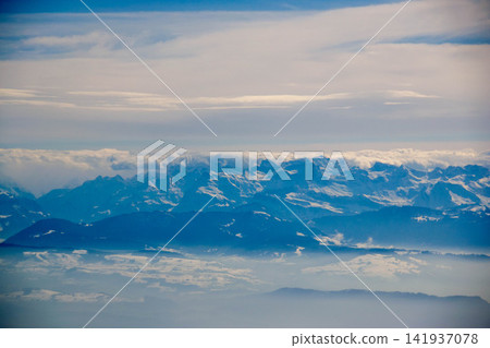 White passenger airplane flying in the sky amazing clouds in the background - Travel by air transport. High quality photo White passenger airplane flying in the sky amazing clouds in the background - Travel by air transport. High quality photo 141937078