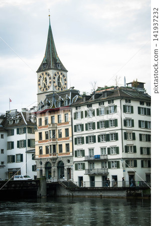 Scenic summer view of the Old Town architecture of Zurich with the bridge Untertorbryukke over Aare river, Zurich, Switzerland. High quality photo Scenic summer view of the Old Town architecture of Zurich with the bridge Untertorbryukke over Aare river, Zurich, Switzerland. High quality photo 141937232