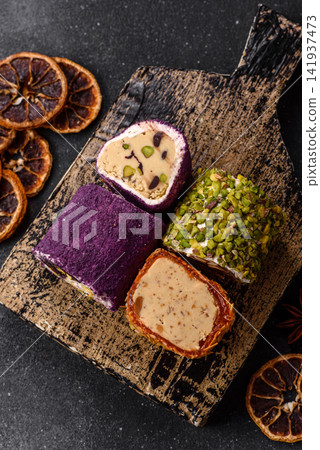 Turkish delight or lokum is a traditional Eastern sweet made with nuts. Turkish delight, lokum Turkish delight or lokum is a traditional Eastern sweet made with nuts. Turkish delight, lokum 141937473