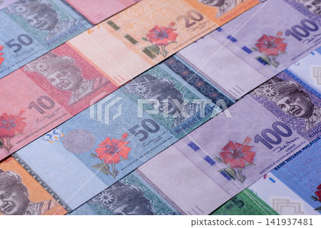 Malaysian ringgit banknotes as a tool for trade and financial transactions. The Malaysian ringgit Malaysian ringgit banknotes as a tool for trade and financial transactions. The Malaysian ringgit 141937481