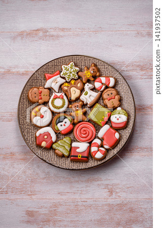 Gingerbread as a Christmas staple, sweet biscuits for the holiday. Gingerbread as a background 141937502