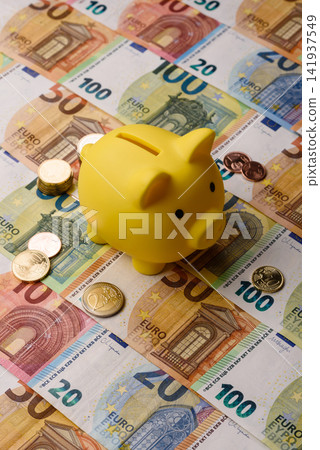 A piggy bank as a concept for storing, accumulating, and saving financial resources. A piggy bank A piggy bank as a concept for storing, accumulating, and saving financial resources. A piggy bank 141937549