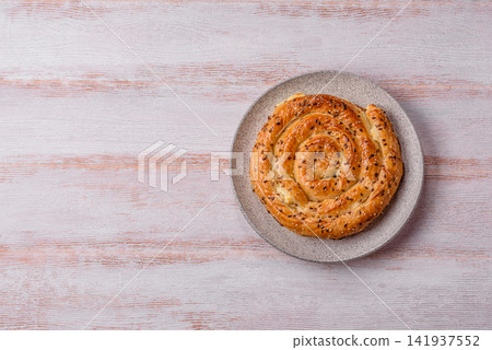 Greek cheese and sesame pie, a traditional Balkan dish. Balkan pie 141937552
