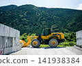 Excavator working on the coast 141938384