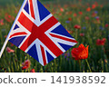 Union jack flag with poppies in a remembrance field 141938592