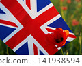 Union jack flag with red poppy flower for remembrance day 141938594