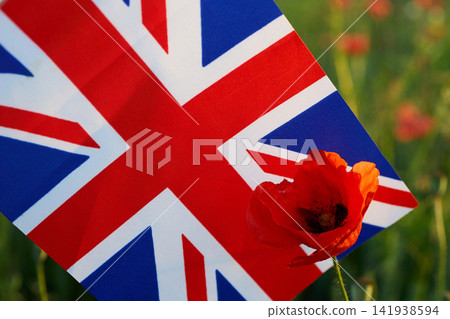 Union jack flag with red poppy flower for remembrance day Union jack flag with red poppy flower for remembrance day 141938594