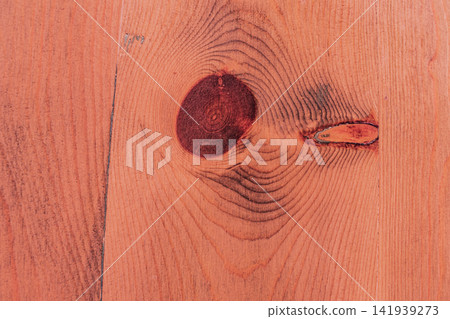 Warm reddish brown wood texture background with natural knots detailed timber board surface close up full frame background for design stock photo Warm reddish brown wood texture background with natural knots detailed timber board surface close up full frame background for design stock photo 141939273