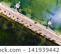 Aerial top view Lo Pagan coastal seafront and Mediterranean Sea 141939442