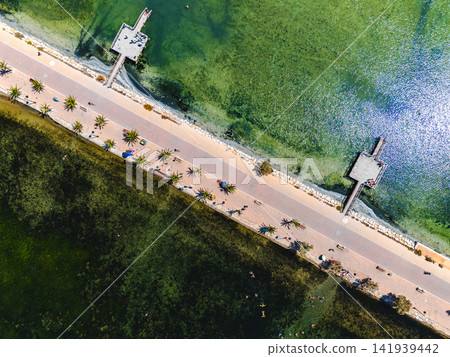Aerial top view Lo Pagan coastal seafront and Mediterranean Sea Aerial top view Lo Pagan coastal seafront and Mediterranean Sea 141939442