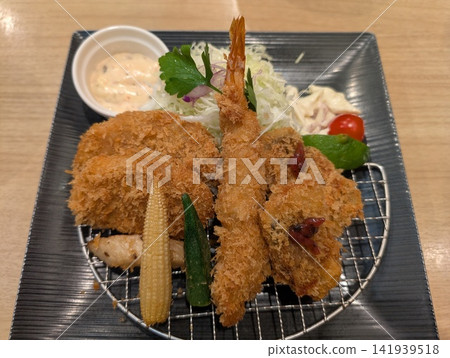 Fried food served on a plate Fried food served on a plate 141939518