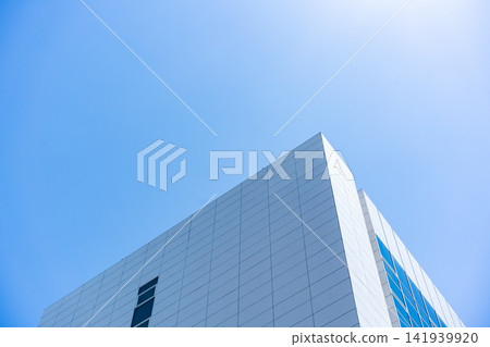 Glass Facade Office Building Under Blue Sky for Modern Architecture Corporate Vision and Real Estate Investment Background, Low Angle Perspective Photo with Copyspace Glass Facade Office Building Under Blue Sky for Modern Architecture Corporate Vision and Real Estate Investment Background, Low Angle Perspective Photo with Copyspace 141939920