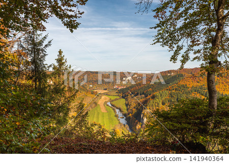 Scenic autumn view of the Upper Danube Valley with Beuron Abbey, Swabian Alb, Germany Scenic autumn view of the Upper Danube Valley with Beuron Abbey, Swabian Alb, Germany 141940364