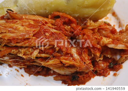 Kimchi with Boiled Potato Close-up Kimchi with Boiled Potato Close-up 141940559
