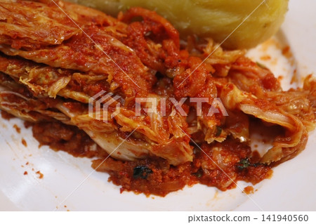 Kimchi and Potato Dish Close-up Kimchi and Potato Dish Close-up 141940560