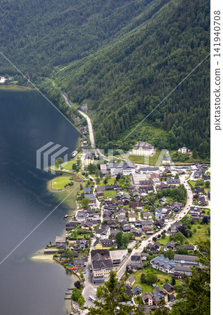 View of the city of Hallstatt and Lake Hallstattersee from a mountain in Austria View of the city of Hallstatt and Lake Hallstattersee from a mountain in Austria 141940708