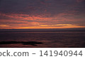 Sunset over the sea 141940944
